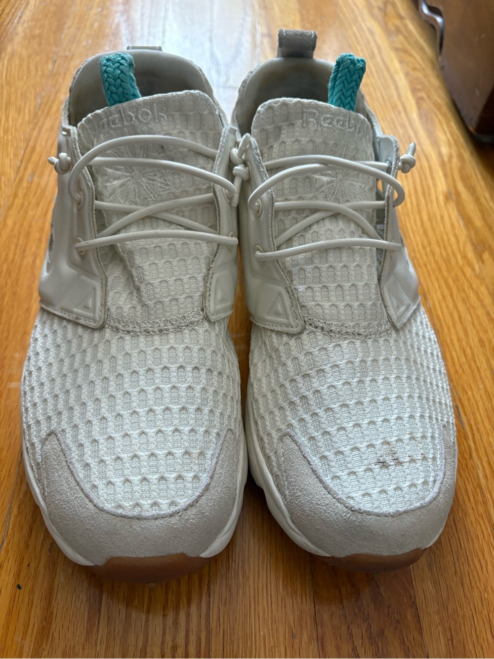 Reebok Cream Knit Slip-On Sneakers with Teal Accent